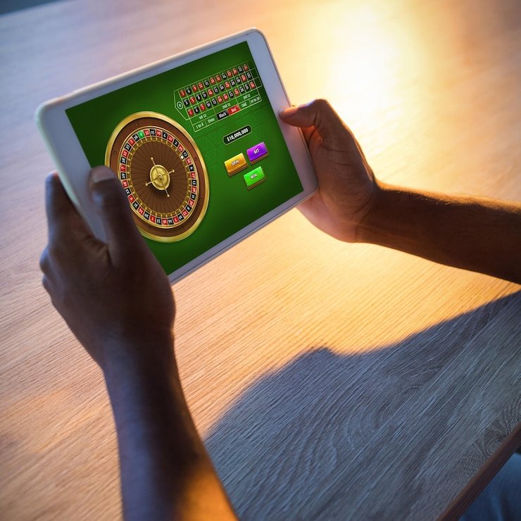 Layar pemilihan angka Cambodia Pools dengan grid angka 00-99 dan tombol konfirmasi